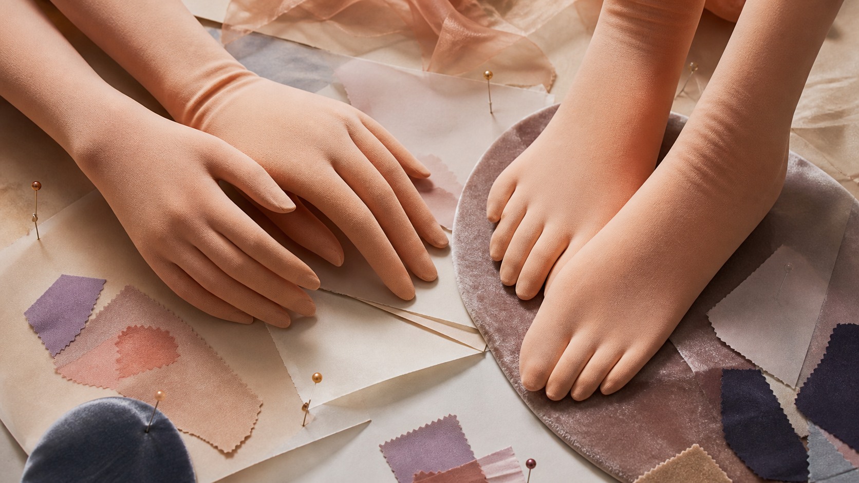 Original concept illustration: warm cream editorial flat lay with Kig hadatai five-finger fabric hands, five-toe sock feet, fabric swatches, sewing pins, and soft paper texture; used to explain endpoint continuity, not a shop item or buyer review photo.